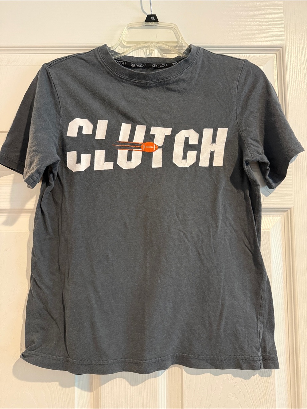 Xersion Boys Black Graphic 'CLUTCH' Tee with Orange Accent